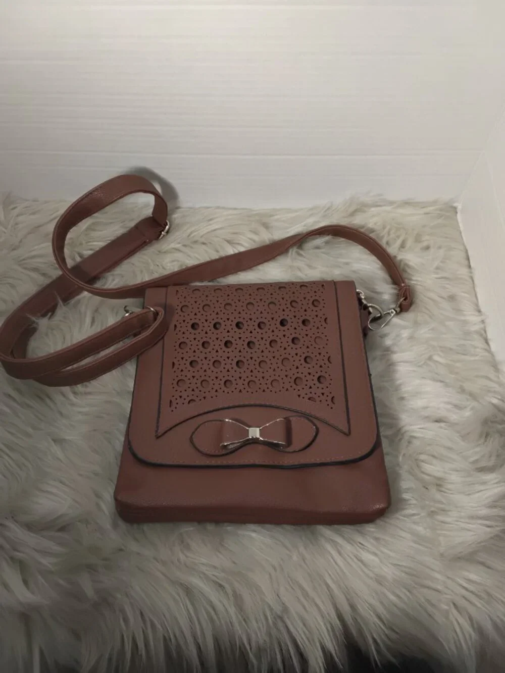 Brown Leather Handbag – Perforated Front & Bow Accent